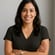 Someone who looks like Rebecca Martinez an executive coach Do not have her wearing a blazer or suit but similar professional clothing-1